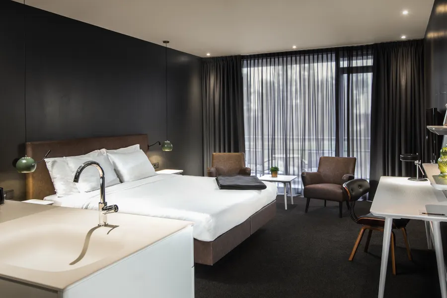 Hotel room | Bed | Open bathroom