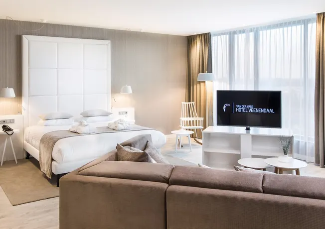 Wellness suite met sauna, stoomdouche, bad en kingsize bed