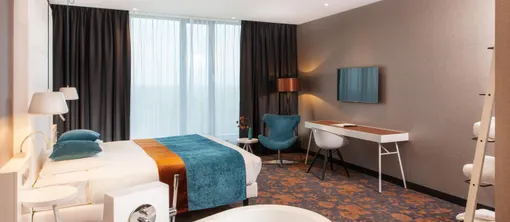 Slaapkamer en badkamer Superior Hotelkamer Hotel Veenendaal