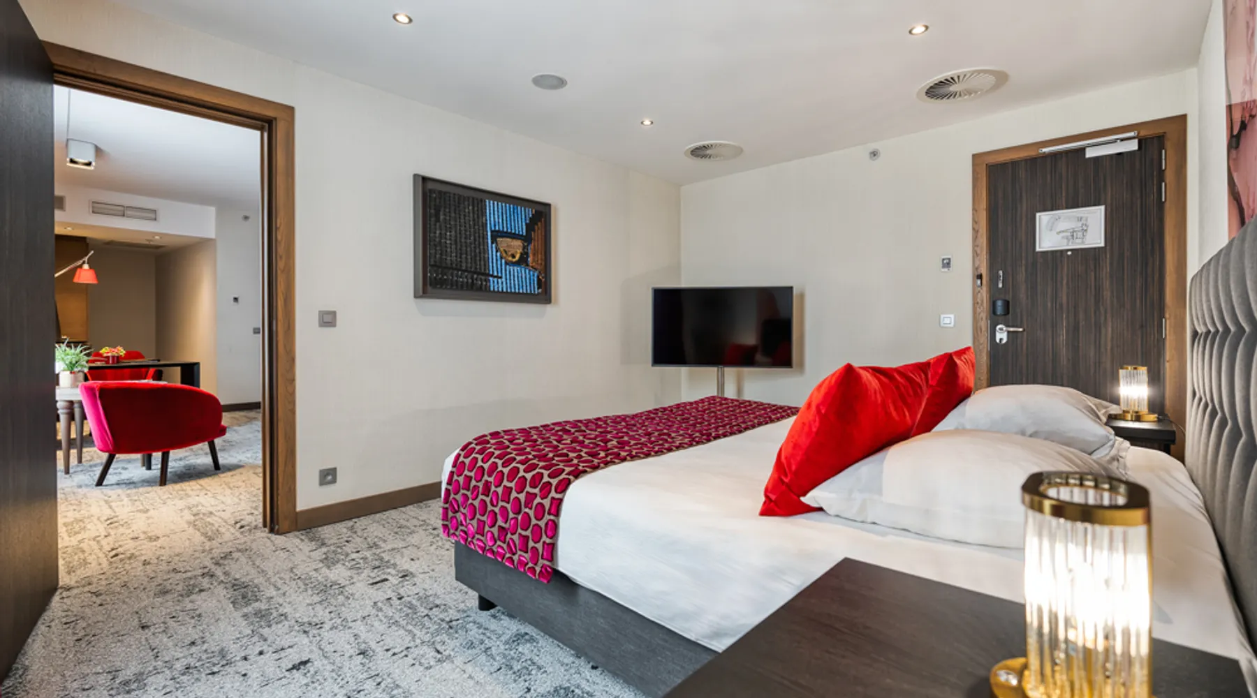 Lits king size dans une chambre familiale à l’Hôtel Van der Valk Sélys Liège