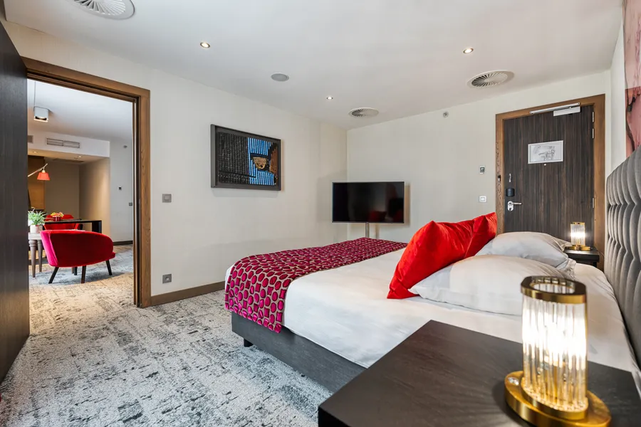 Lits king size dans une chambre familiale à l’Hôtel Van der Valk Sélys Liège