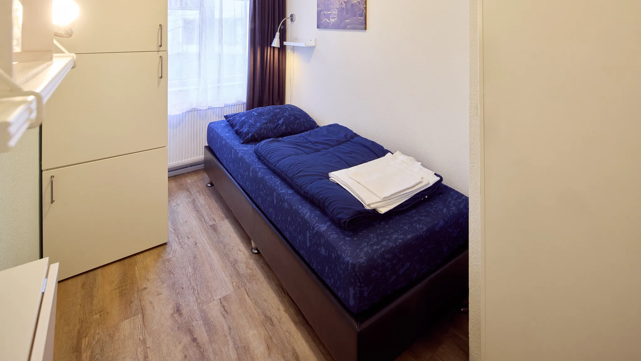 Tweede slaapkamer met 2 losse bedden