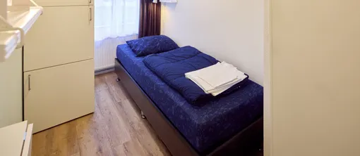 Tweede slaapkamer met 2 losse bedden