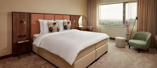 Bett im Deluxe-Zimmer
