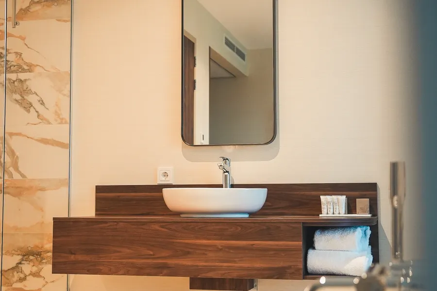 Open bathroom with bath