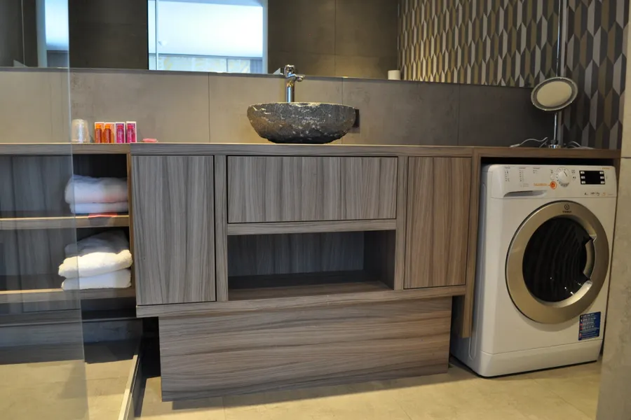 Badkamer met wasmachine