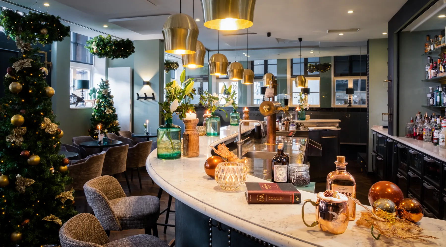 The hotel bar is stylishly and festively decorated.