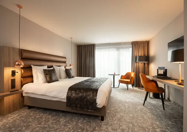 Chambre exécutive spacieuse et élégante à l’Hotel Nivelles-Sud