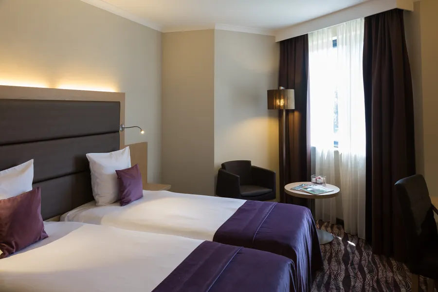 Chambre économique avec lits jumeaux à l’hôtel Van der Valk Nivelles