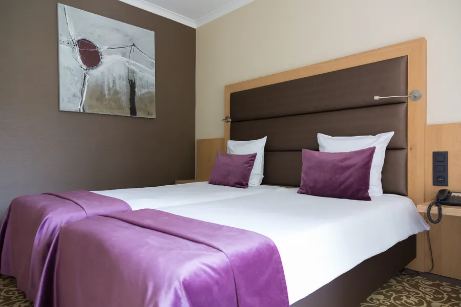 Chambre supérieure avec lits jumeaux à l’hôtel Van der Valk Nivelles
