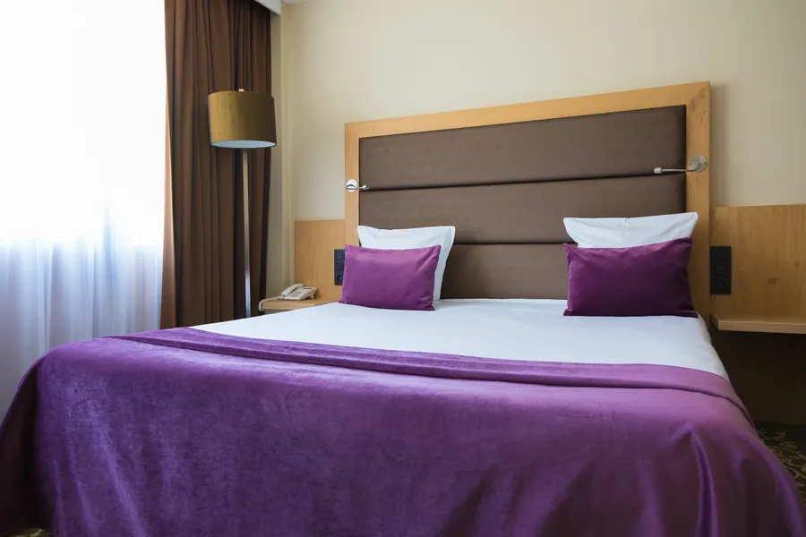 Lit confortable dans la chambre familiale à Nivelles