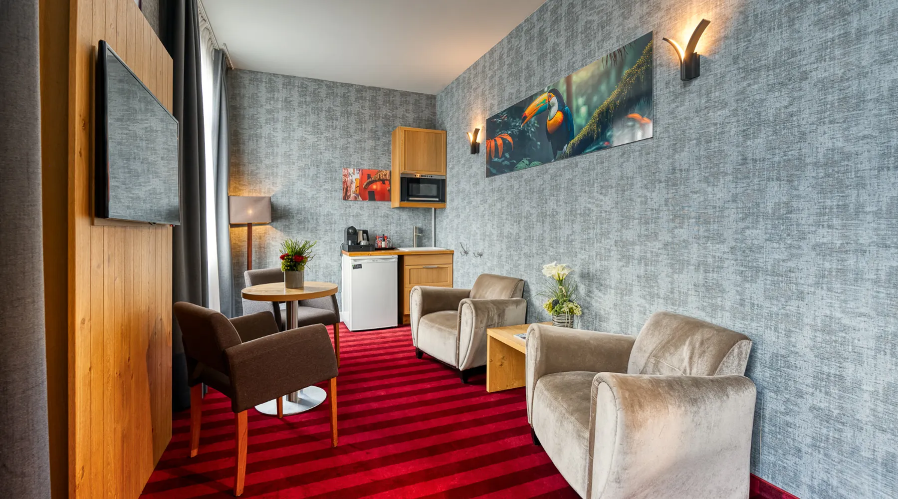 Coin salon de la Suite Wellness avec jacuzzi à Verviers